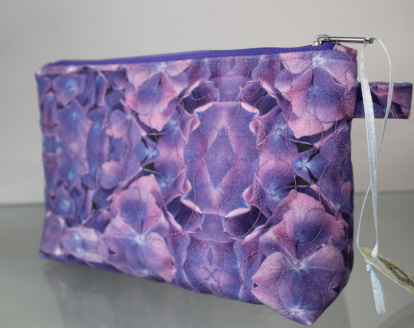 Trisz cosmetic bag with unique embroidery design